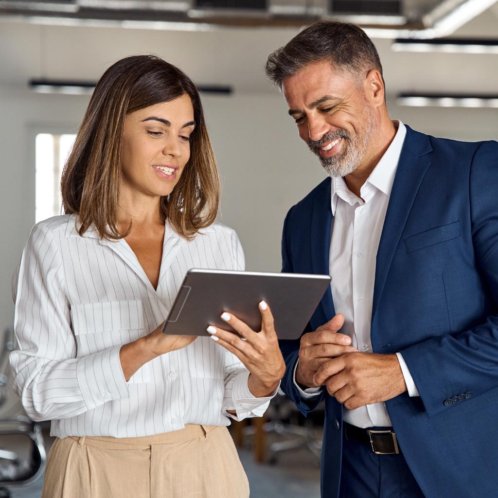 Employees collaborating in a workplace setting.