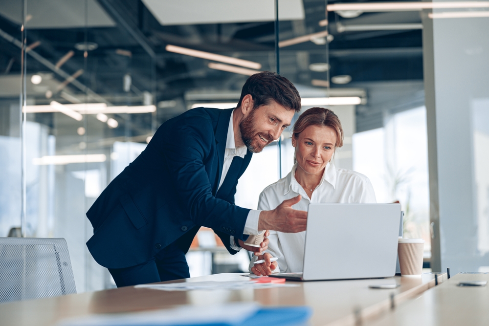 Business or promotional stock image featuring professionals, workplace interaction, or company services.