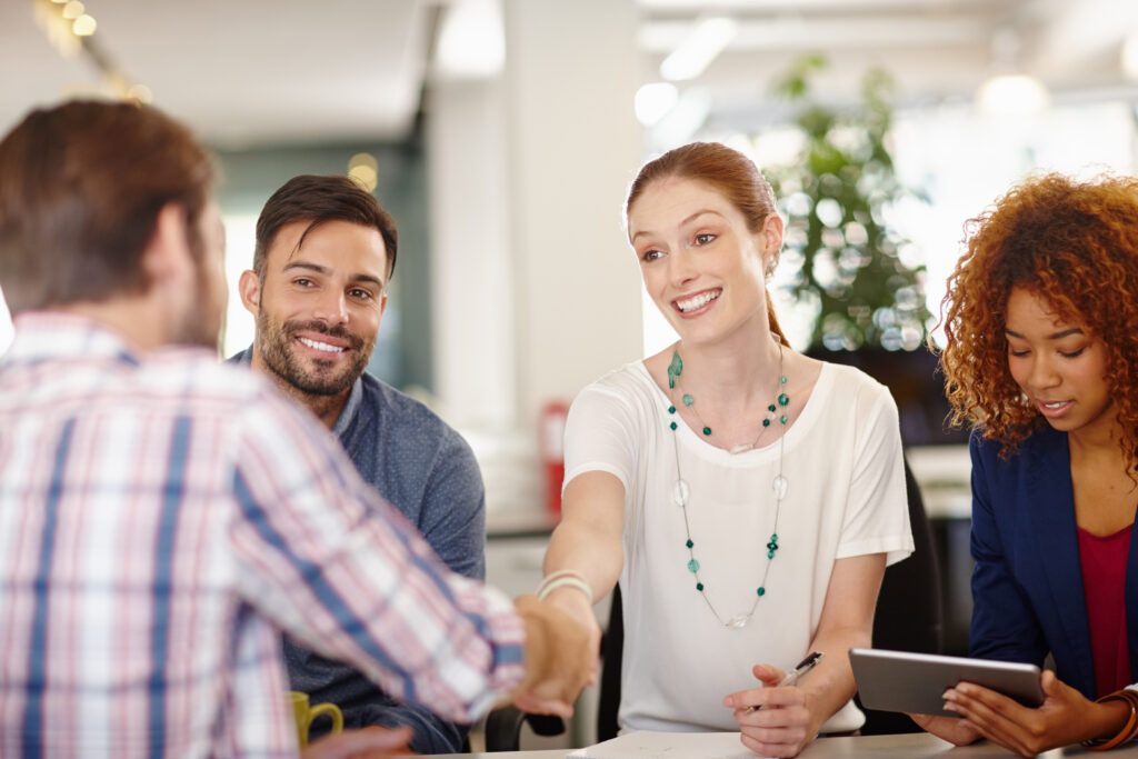 A group of professionals developing together through a customer interaction